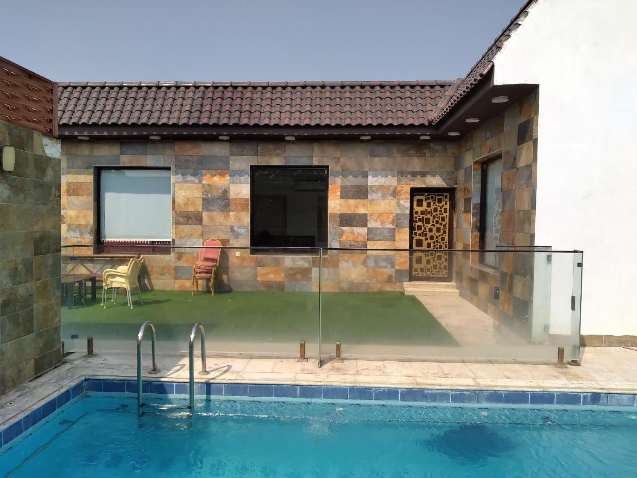 Villa شاليهات الكوخ السويسري وأكوابارك Ash Shishah Exterior foto
