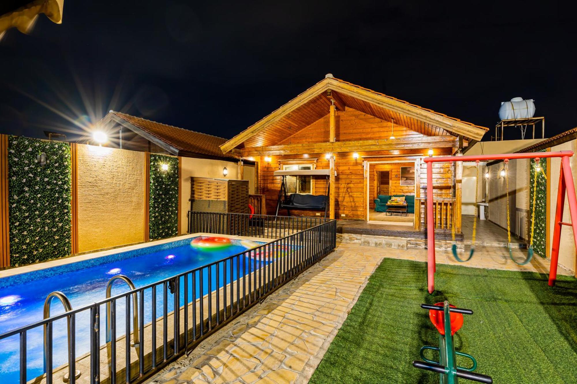Villa شاليهات الكوخ السويسري وأكوابارك Ash Shishah Exterior foto