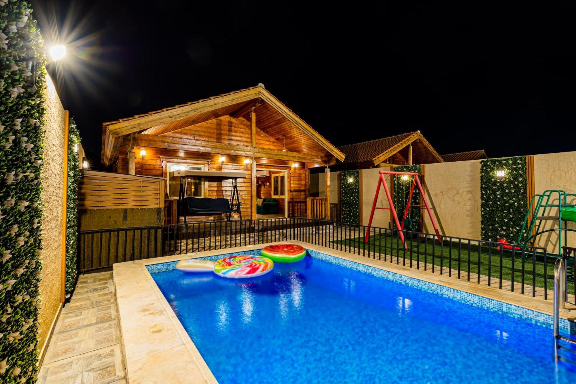 Villa شاليهات الكوخ السويسري وأكوابارك Ash Shishah Exterior foto